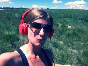 Yeah, this is how I ride training miles...get better sunglasses, Sarah.  And wear a MF helmet!